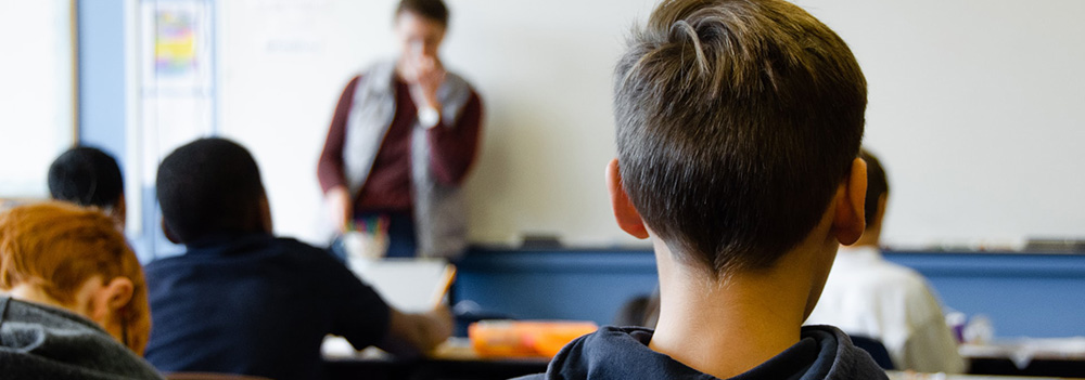 Boys in classroom - by Taylor Wilcox on Unsplash