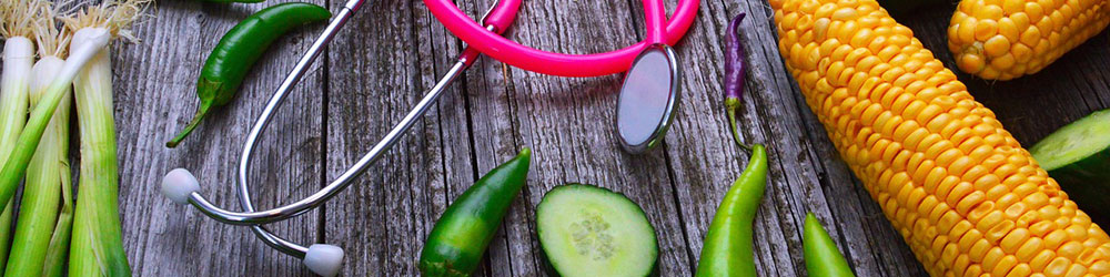 Stethoscope and healthy food